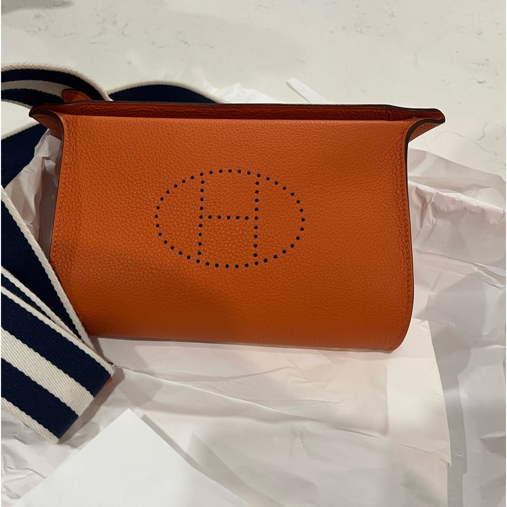 Hermes Vide Pouches Togo Calfskin purse. Orange with blue/white stripe strap